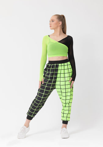 Dance model wearing Studio 7 Neon Green Geo Print Harem Pants front view