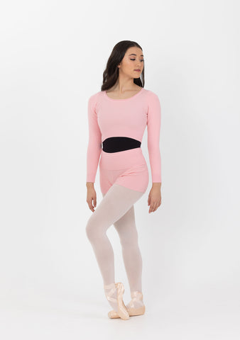 Dance model wearing Studio 7 Ribbed Warm Up Top in Ballet Pink front view